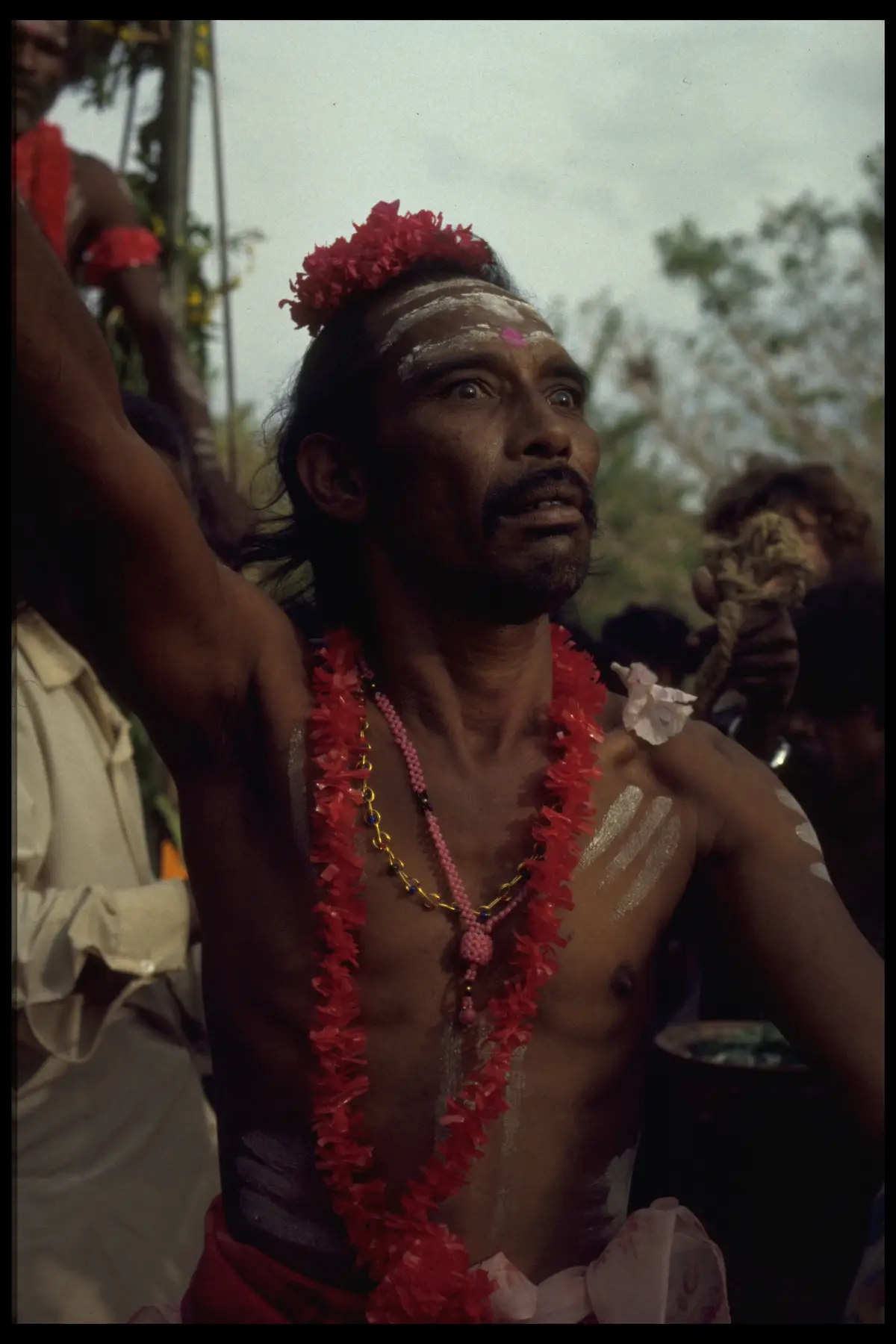 Kavadi devotee garland portrait