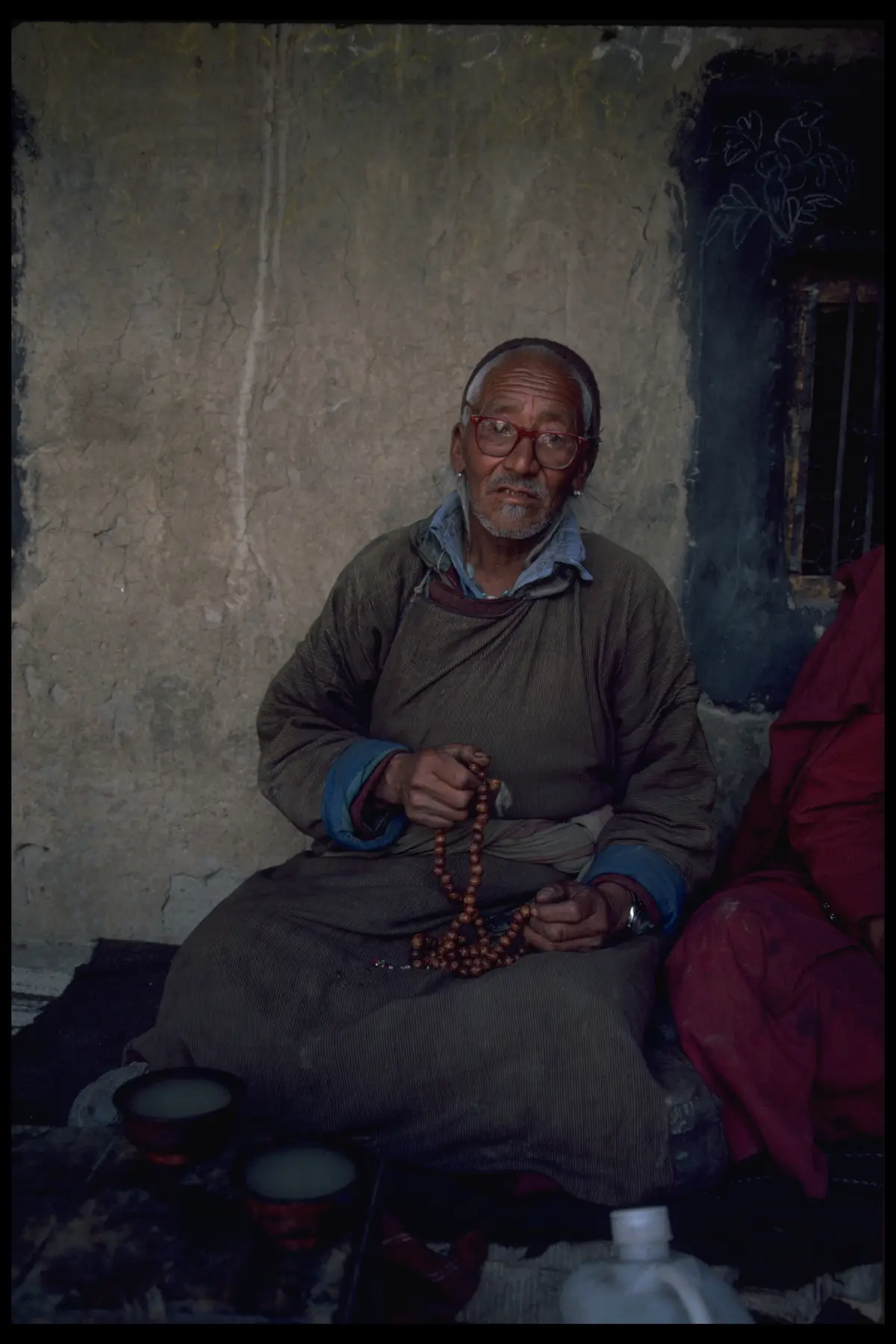 Elder with prayer beads