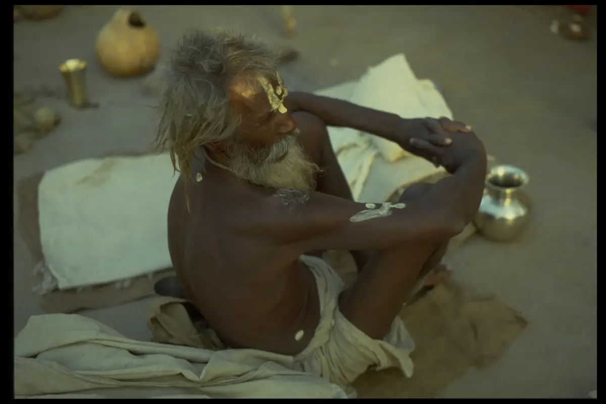 Sadhu seated water pots