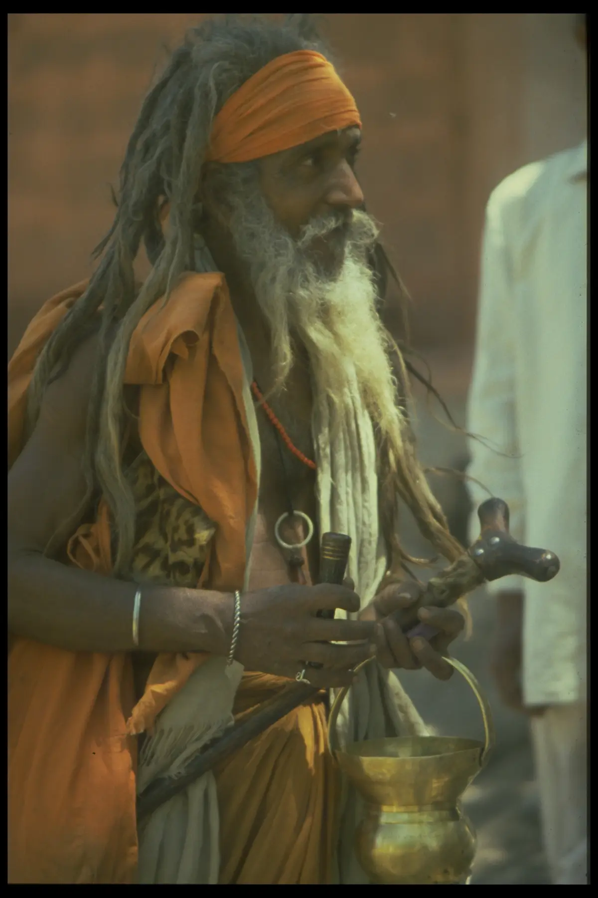Sadhu orange turban chillum