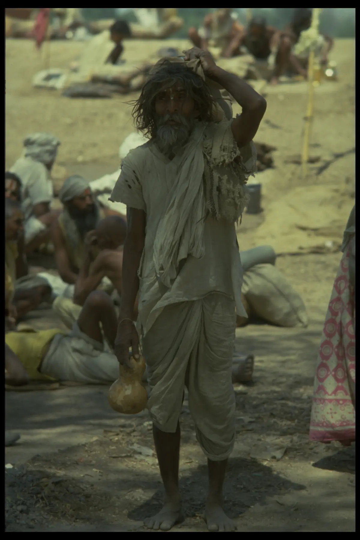 Pilgrim standing lota camp
