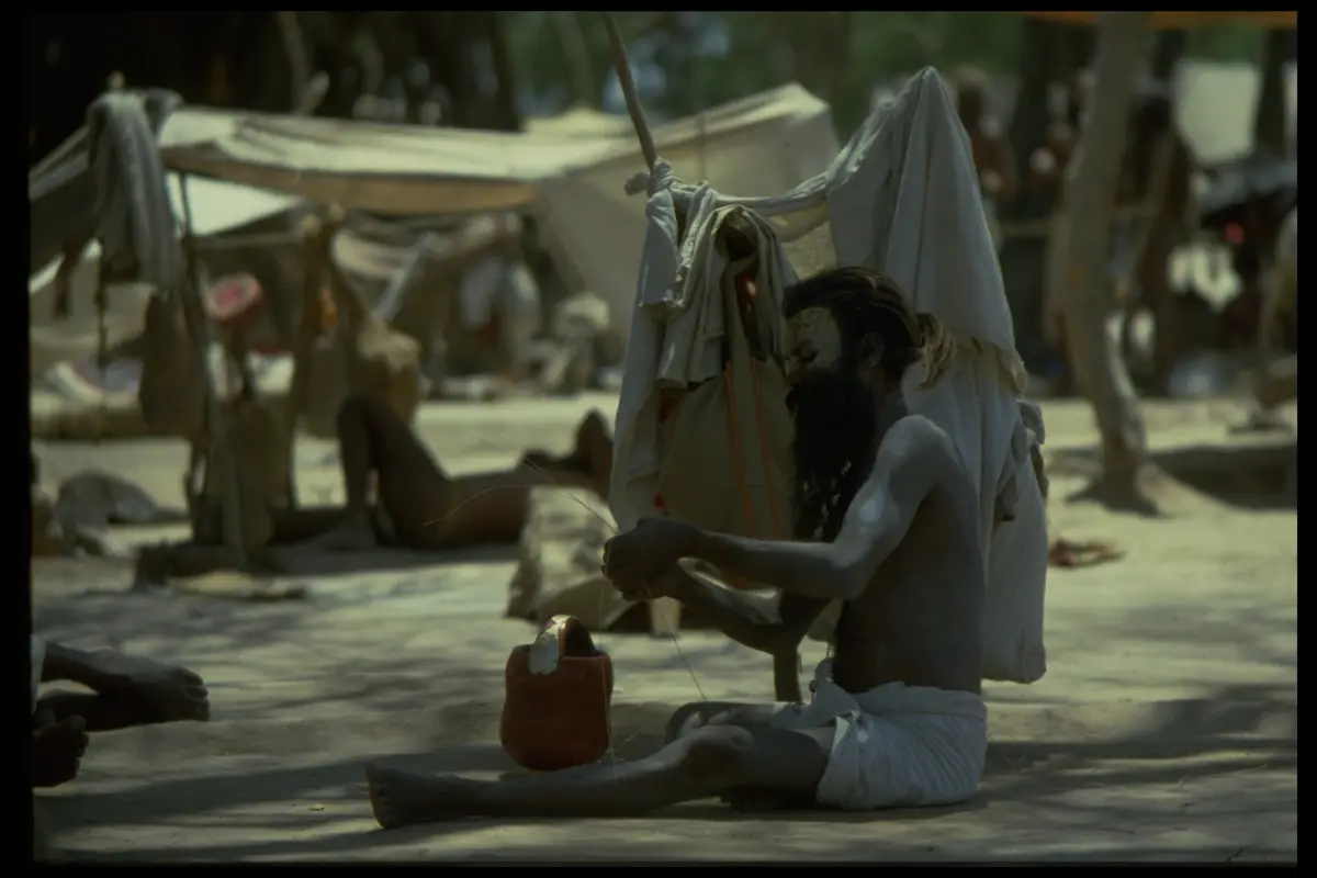 Sadhu seated camp makeshift shelter