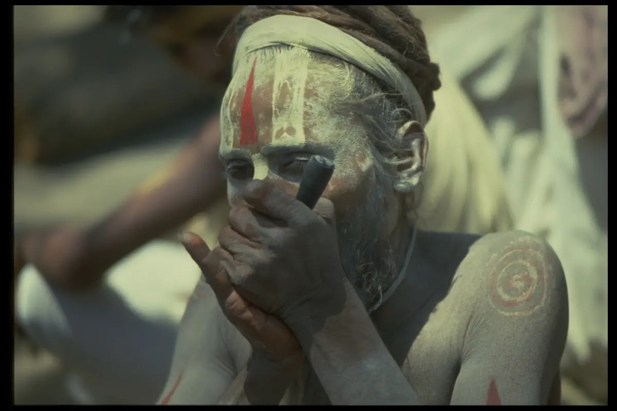 Sadhu close red tilak swastika arm