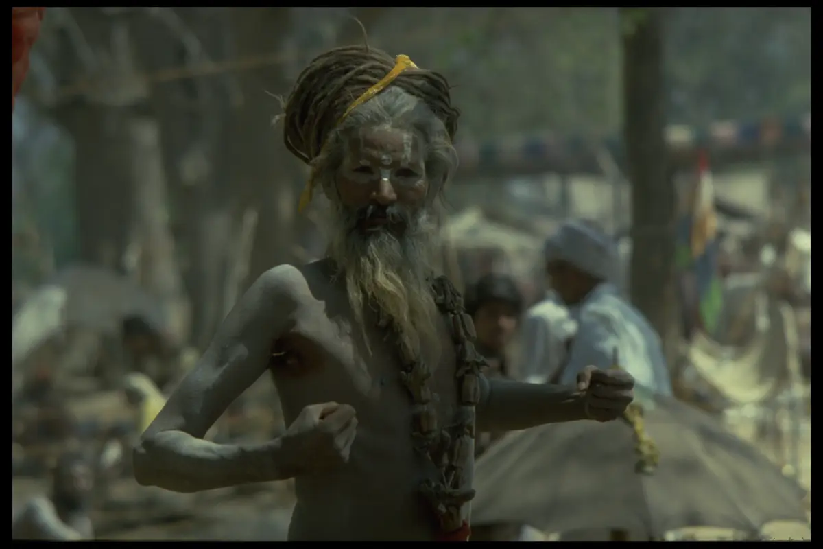 Sadhu dreadlocked fists raised